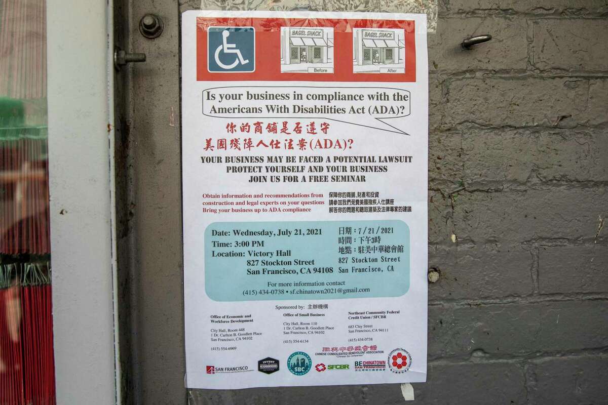A Chinatown poster promotes a free seminar on protecting businesses from frivolous Americans With Disabilities Act compliance lawsuits,