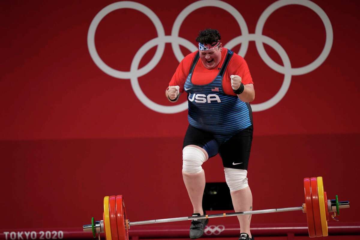 Sarah Robles, who trains in Houston, celebrates after completing a lift, in the women's +87kg weightlifting event at the 2020 Summer Olympics.