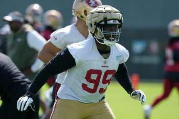 San Francisco 49ers defensive tackle Javon Kinlaw (99) runs onto the field  during an NFL football game against the Arizona Cardinals, Sunday, Jan.8,  2023, in Santa Clara, Calif. (AP Photo/Scot Tucker Stock