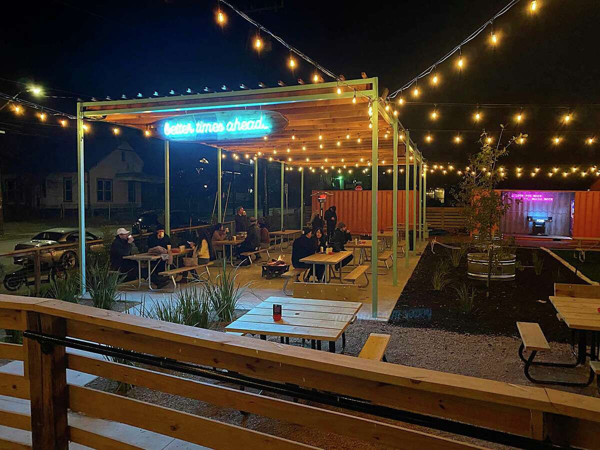 The courtyard neon promises "better times ahead" at Thai restaurant and tiki-inspired bar Hello Paradise, situated at the former Shuck Shack on Grayson Street in San Antonio.