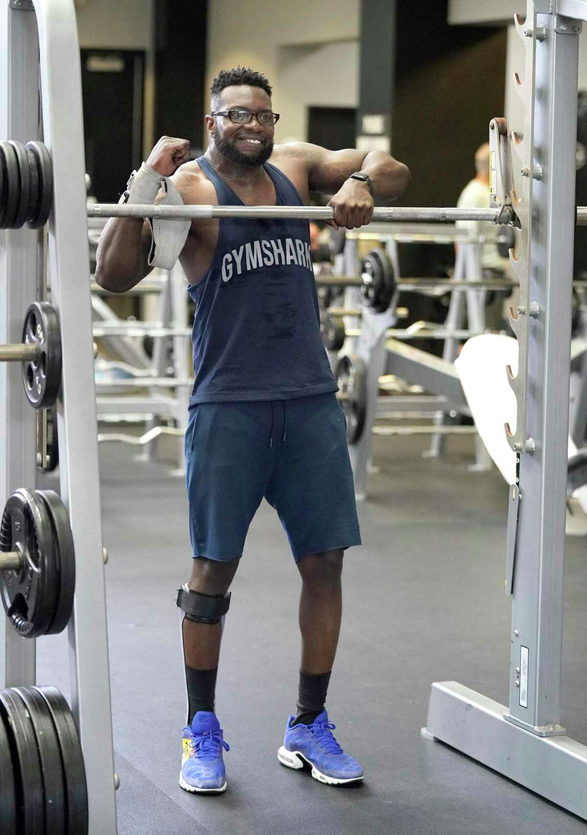 Kel Mabatah works out at Club Westside, 1200 Wilcrest Dr., Saturday, July 24, 2021 in Houston as he prepares for a bodybuilding competition. In Dec. 2014, he was brutal assaulted in Nigeria, where he was helping run his family’s business. He suffered traumatic brain injury, was partial paralyzed, and could not speak.