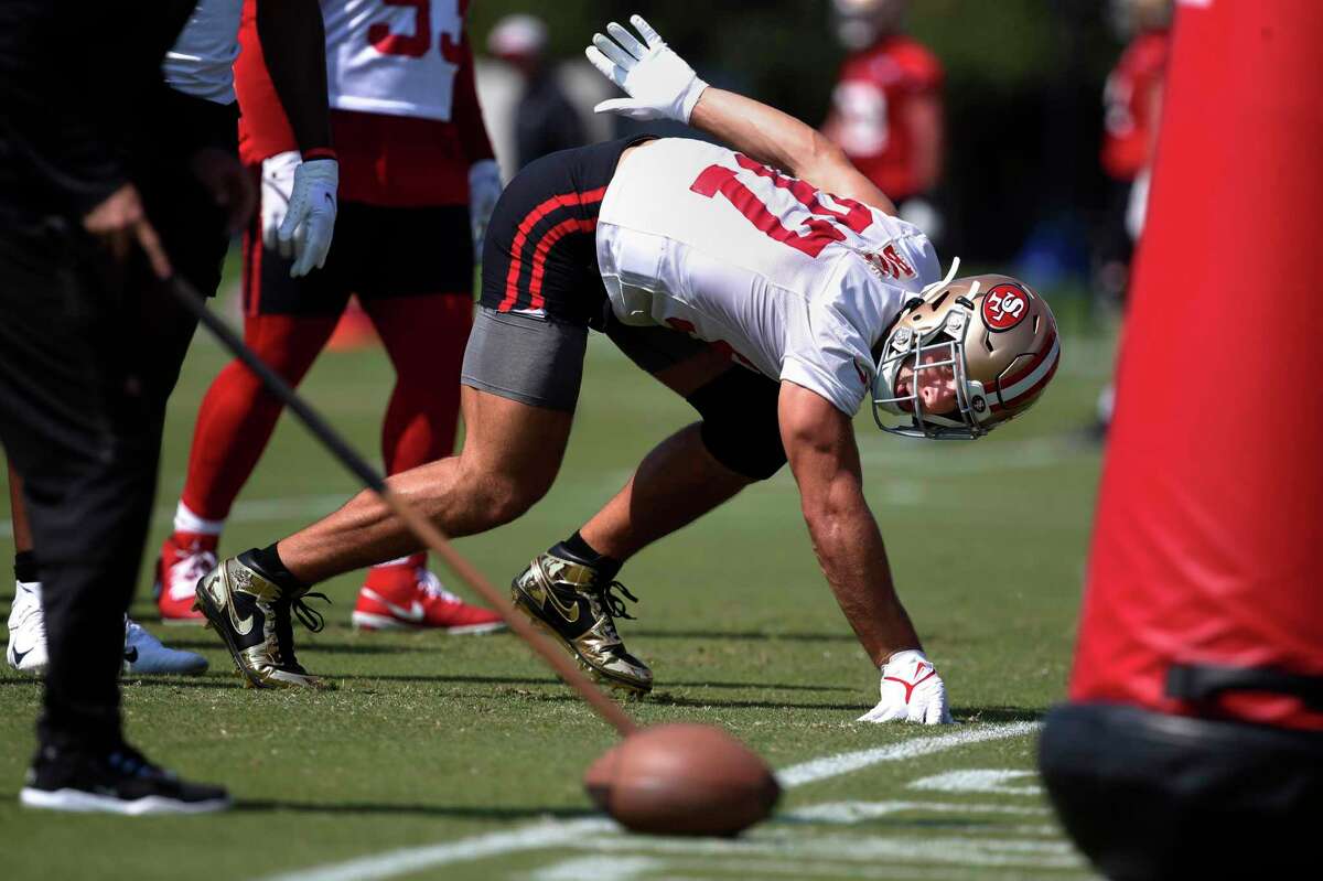 San Francisco 49ers defensive end Nick Bosa works out during an NFL football training camp in Santa Clara, Calif., Saturday, July 31, 2021. (AP Photo/Josie Lepe)