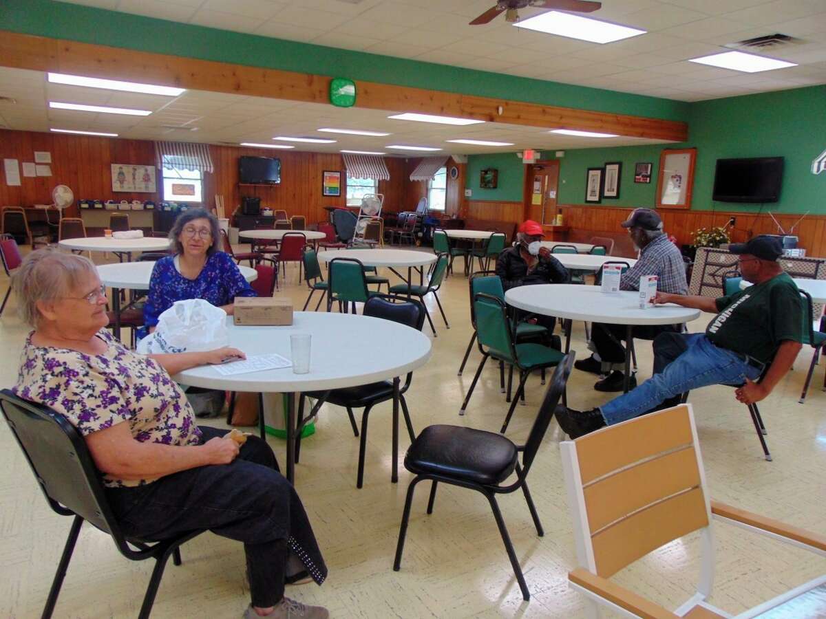 Senior citizens are happy to be able to meet and socialize again, and share a meal. (Star photo/Shanna Avery)