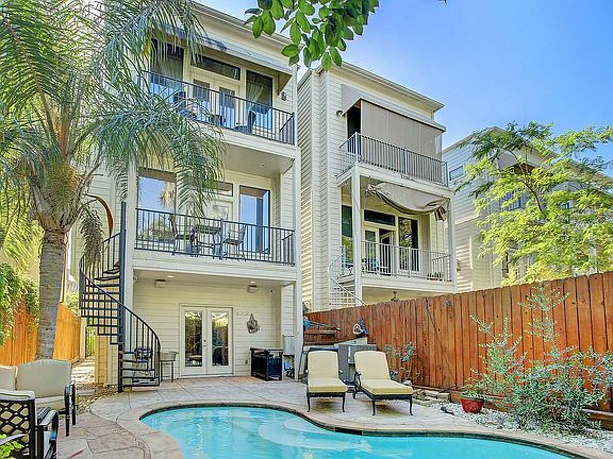 Two balconies overlook the pool.