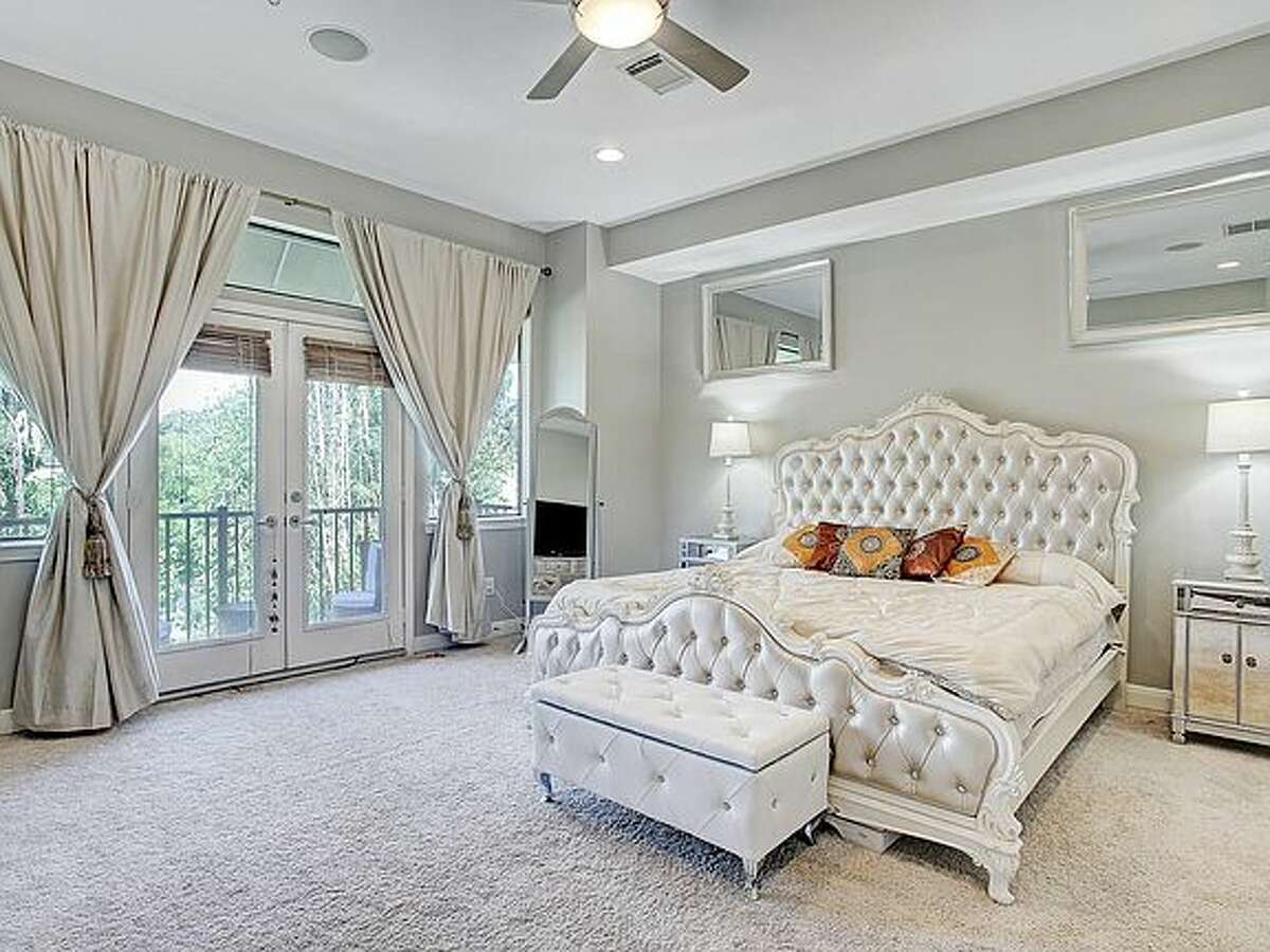 The primary bedroom also has a large closet, private bathroom and a fireplace.
