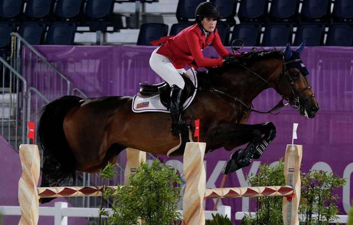 United States' Jessica Springsteen, riding Don Juan van de Donkhoeve, competes during the equestrian jumping individual qualifier during the 2020 Summer Olympics, Tuesday, Aug. 3, 2021, in Tokyo, Japan. [AP Photo/Carolyn Kaster)