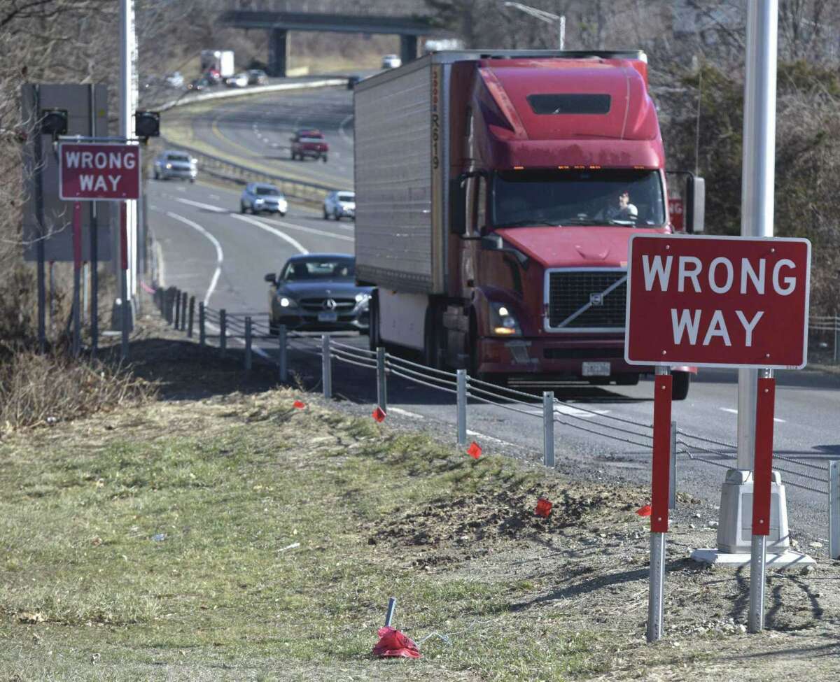 A ‘wrong way’ sign near the Interstate 84 westbound Exit 8 off-ramp.