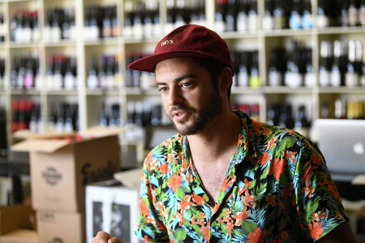 Solomo Gerges is the owner of Eclipse Coffee on the St. Mary's strip. He prepares drinks on Thursday, July 22, 2021.