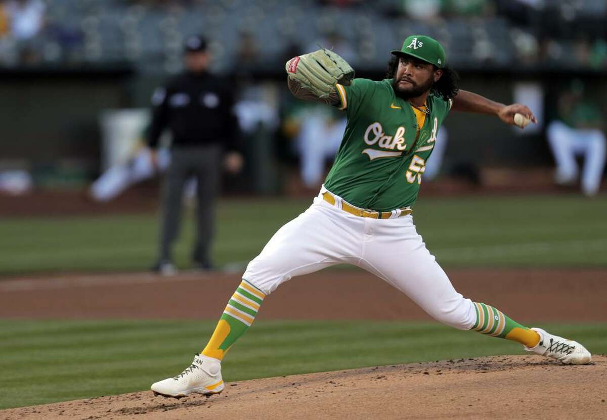 Pitcher Sean Manaea (55) throws in the first inning as the Oakland Athletics played the San Diego Padres at the Coliseum in Oakland, Calif., on Tuesday, August 3, 2021.