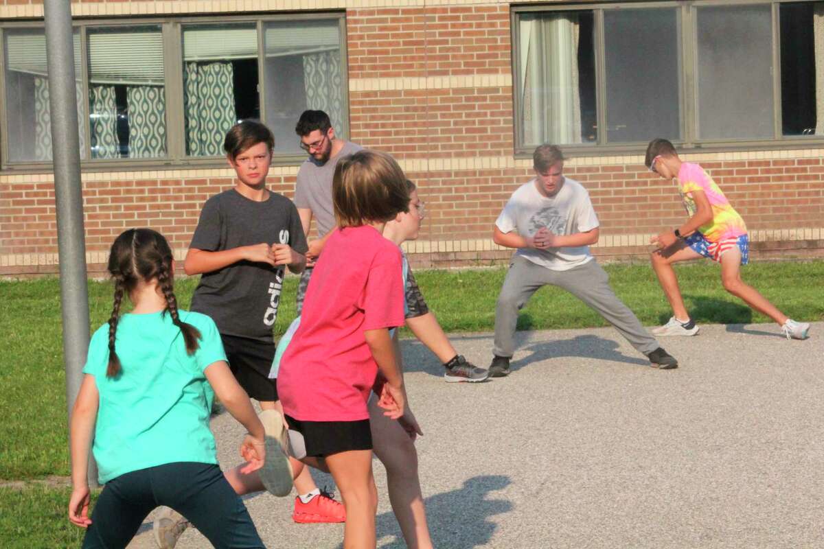 Reed City runners get ready for a team run last week. (Herald Review photo/John Raffel)