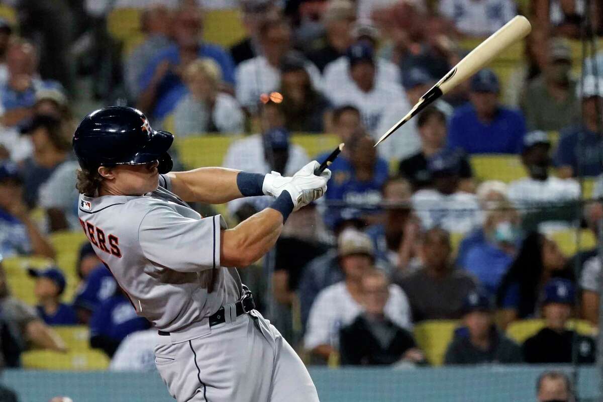 Houston Astros' Jake Meyers breaks his bat as he grounds out during the ninth inning of the team's baseball game against the Los Angeles Dodgers on Tuesday, Aug. 3, 2021, in Los Angeles. (AP Photo/Marcio Jose Sanchez)