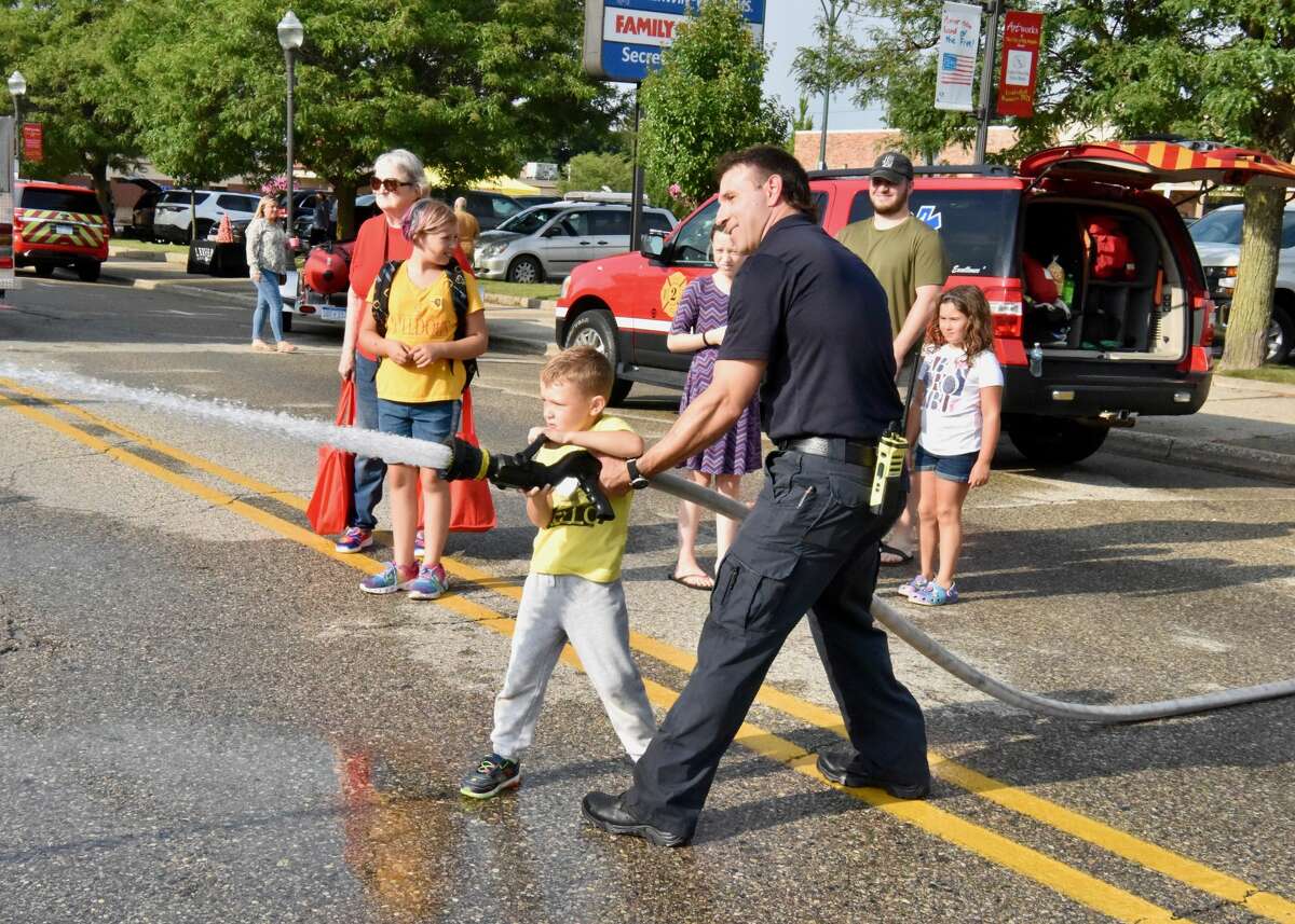 Local law enforcement agencies teamed up Tuesday to host National Night Out in downtown Big Rapids. National Night Out is an annual community-building campaign that promotes police-community partnerships and neighborhood camaraderie.
