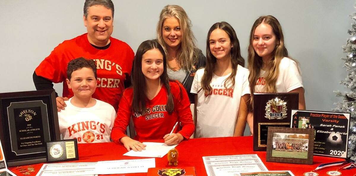Liz Porto signs to play soccer at King’s College (PA). Joining the SCC All-Division midfielder are dad Ron, mom Kathleen, brother Jack and sisters Susie and Mary.