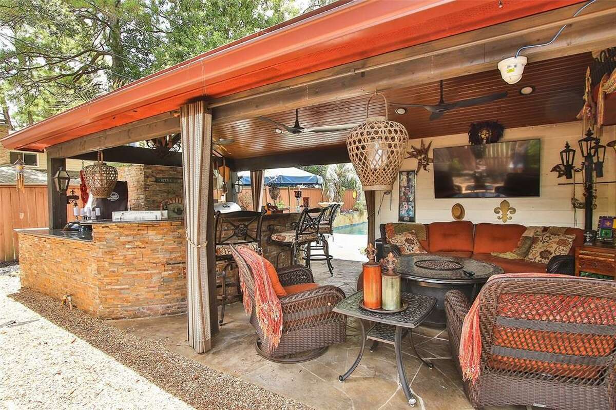 This unique property located at 11907 Fawnview Drive in Northwest Houston, recently hit the market for $350,000 touting animal-themed decor, an elaborate outdoor living space and a Texans-themed room. 