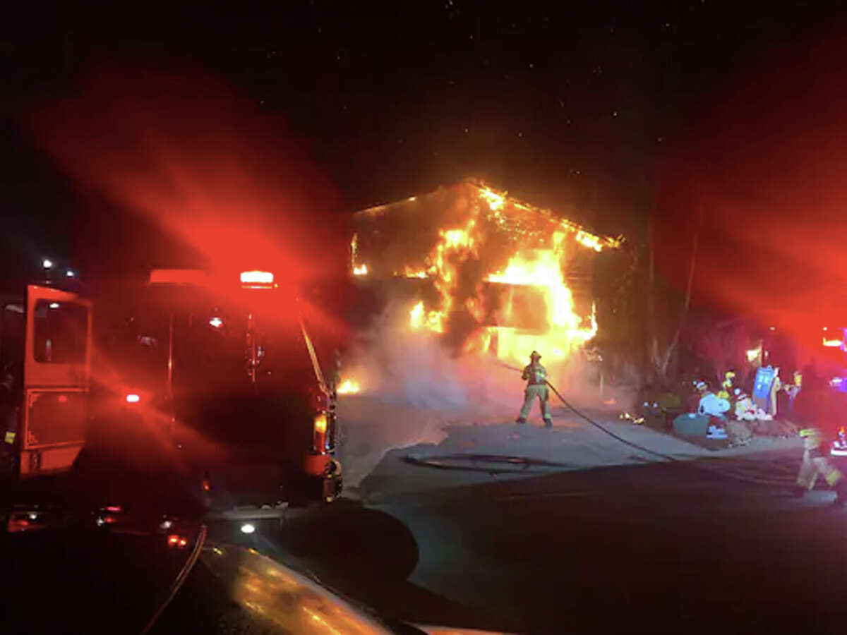 The home of Yogi and Carolyn Vindum in San Ramon, Calif., burns on the morning of Dec. 30 after two Tesla Model S sedans erupted in flames in the garage.