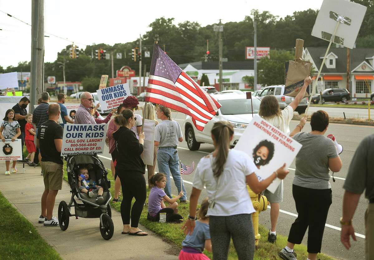 An Unmask Our Kids rally on the Post Road in Milford, Conn. on Tuesday, August 3, 2021. The rally was organized by the Facebook group's Milford chapter.