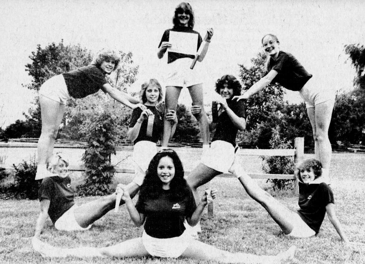 Manistee High School varsity cheerleaders recently attended a camp sponsored by the National Cheerleading Association in Adrian and came away with a "spirit stick" and ribbons for superior spirit performance displayed by the squad. Shown above in winning form are Sarah Loredo (front), along with (second row, left to right) Deanne Jones, Merri Majchrzak, Jill Yonkman, Lisa Walters; and in back (left to right) are Debbie Wiser, Amy Kolanowski and Jodi Radlicki. The photo was published in the News Advocate on Aug. 6, 1981. (Manistee County Historical Museum photo)