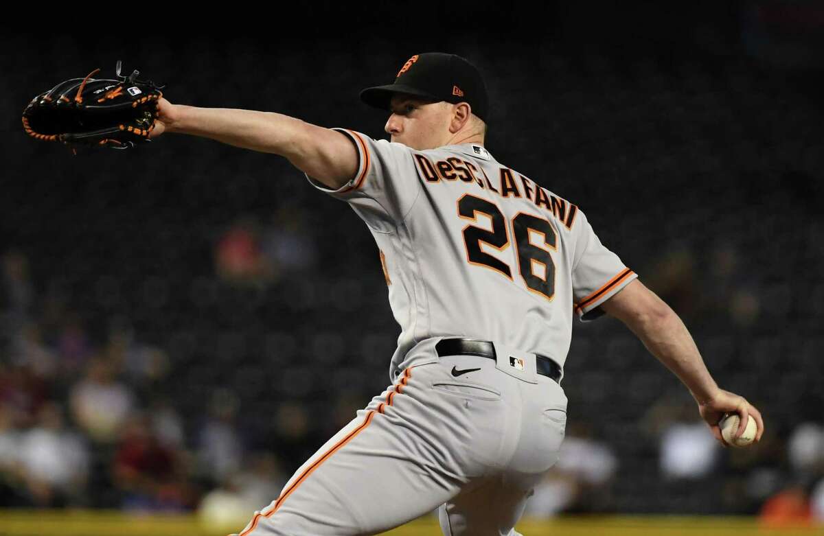 Anthony DeSclafani (26) of the San Francisco Giants delivers a first-inning pitch against the Arizona Diamondbacks at Chase Field on Aug. 2, 2021, in Phoenix. (Norm Hall/Getty Images/TNS)