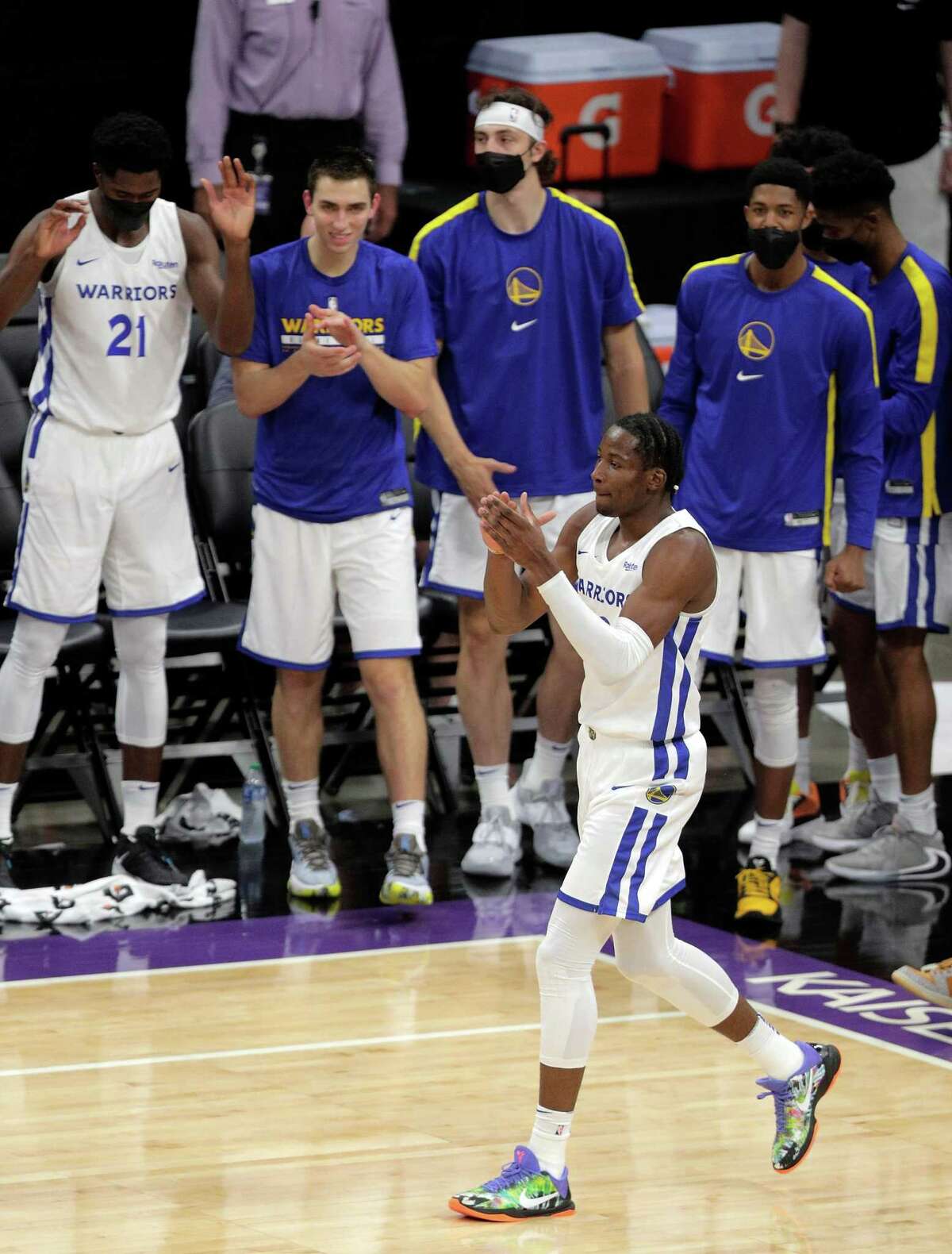 Jonathan Kuminga (00) celebrates after a dunk in the first half as the Golden State Warriors summer league played the Miami Heat Summer league in the 2021 California Classic at Golden 1 Center in Sacramento, Calif., on Wednesday, August 4, 2021.