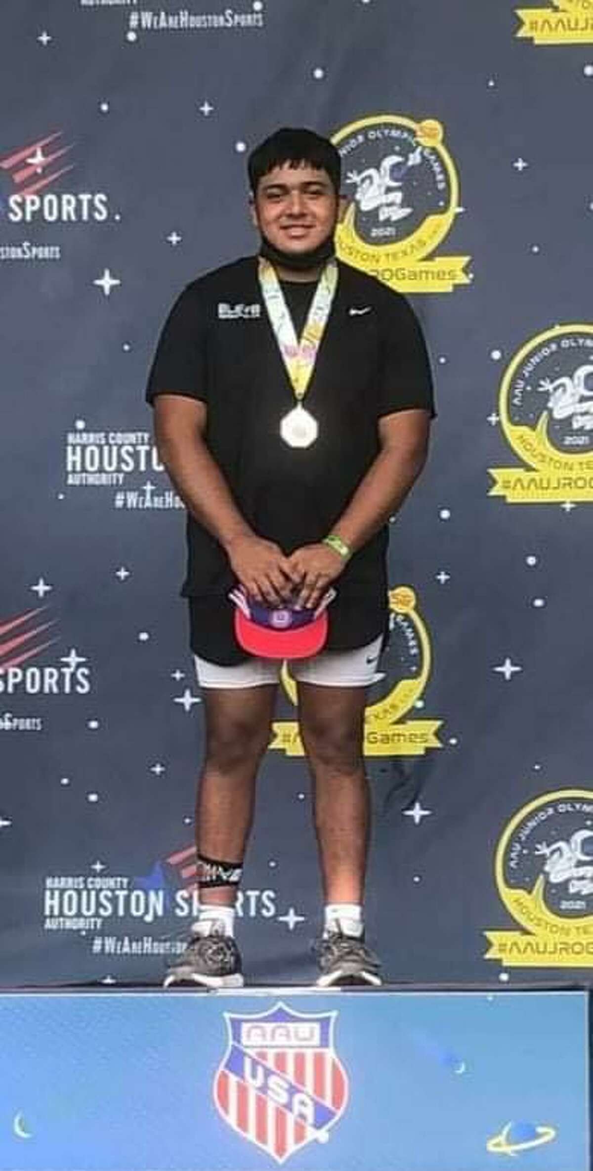 Julian Tijerina earned a gold medal in the shot put at the AAU Junior Olympics in Houston.