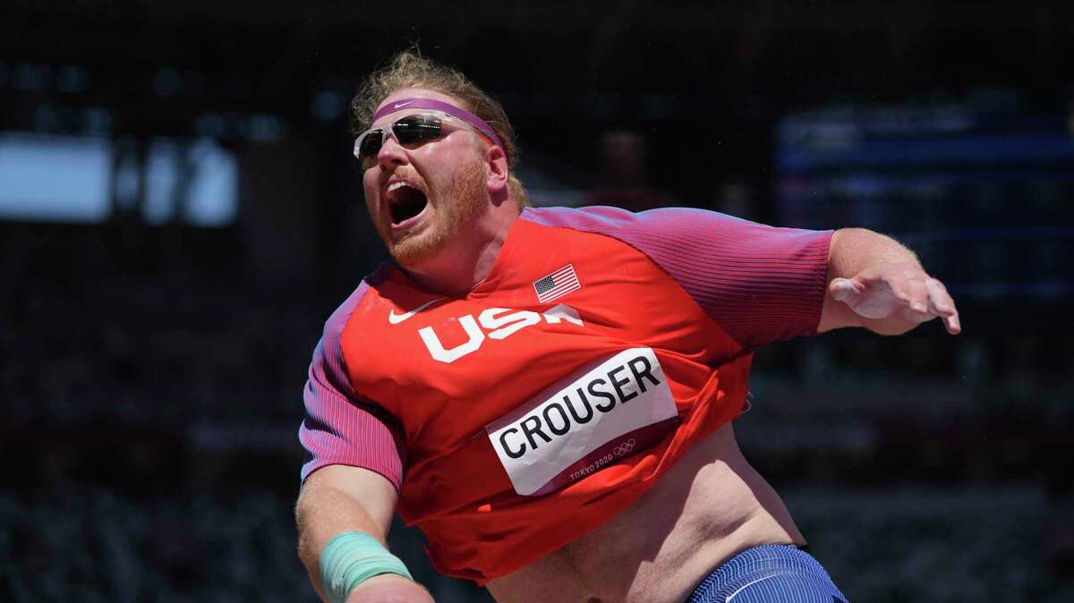 Ryan Crouser, of United States, competes in the final of the men's shot put at the 2020 Summer Olympics, Thursday, Aug. 5, 2021, in Tokyo. (AP Photo/Matthias Schrader)