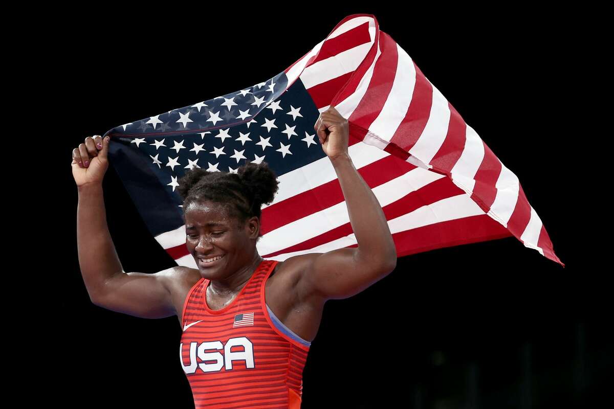 CHIBA, JAPAN - AUGUST 03: Tamyra Mariama Mensah-Stock of Team United States celebrates defeating Blessing Oborududu of Team Nigeria during the Women's Freestyle 68kg Gold Medal Match on day eleven of the Tokyo 2020 Olympic Games at Makuhari Messe Hall on August 03, 2021 in Chiba, Japan. (Photo by Tom Pennington/Getty Images)