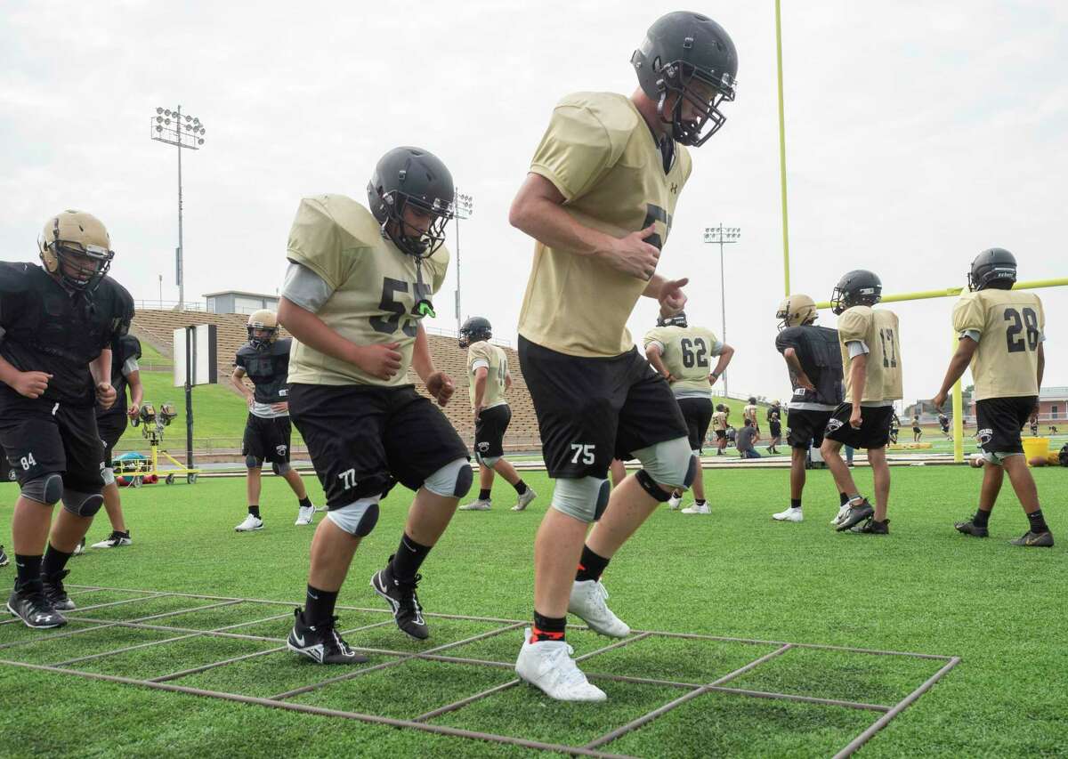 Andrews players run conditioning drills 08/05/2021 after practice at the Mustang Bowl. Tim Fischer/Reporter-Telegram