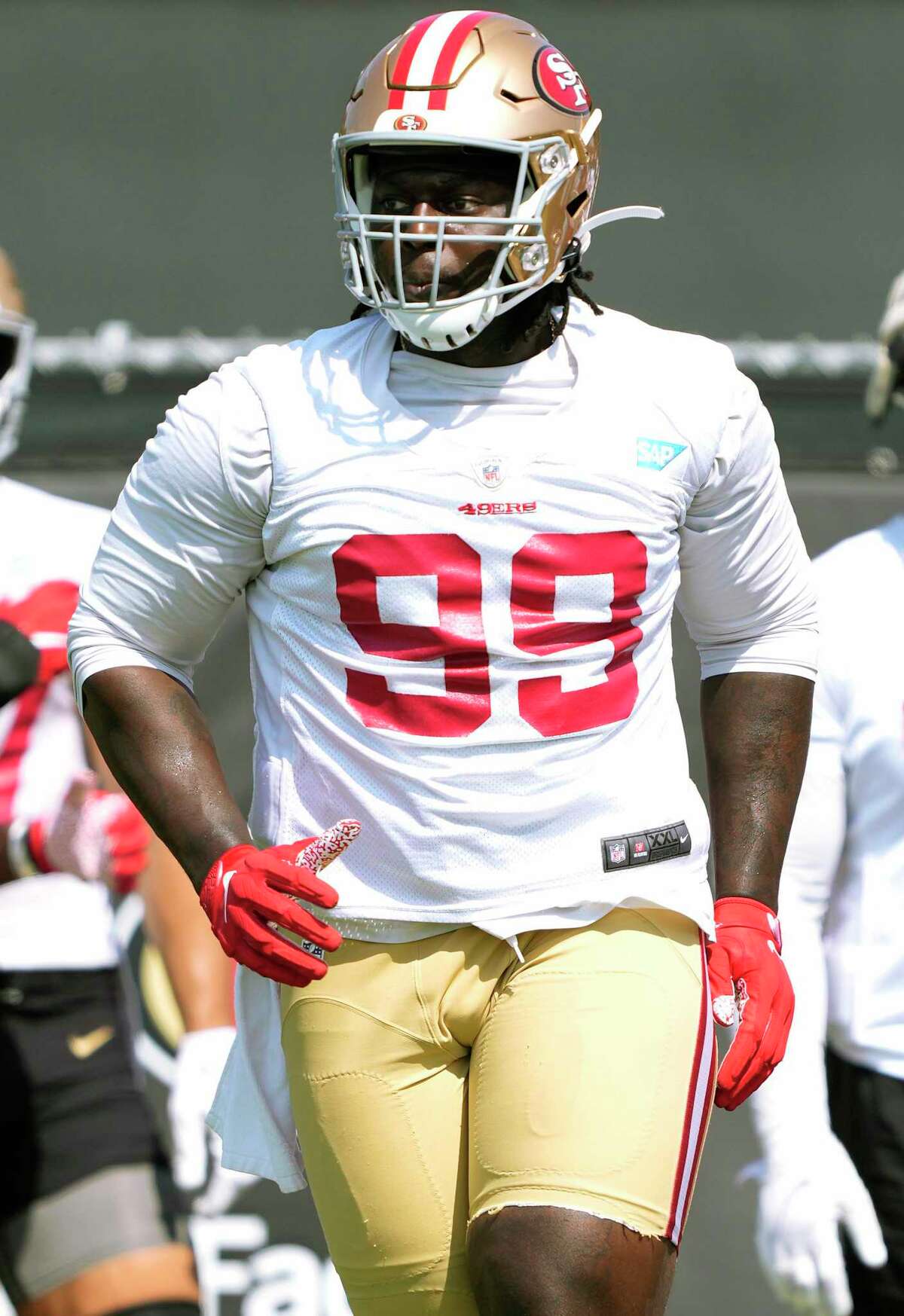 SANTA CLARA, CALIFORNIA - JULY 31: Javon Kinlaw #99 of the San Francisco 49ers works out during training camp at SAP Performance Facility on July 31, 2021 in Santa Clara, California. (Photo by Thearon W. Henderson/Getty Images)