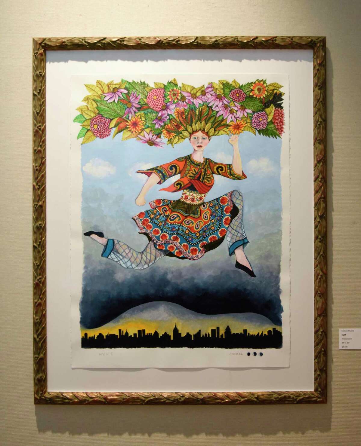 Nancy Moore's watercolor painting "Uplift" is displayed as part of Greenwich Art Society's 104th Annual Juried Exhibition at the Bendheim Gallery in Greenwich, Conn. Tuesday, July 27, 2021. The work, in a variety of mediums, was judged by Allison Rudnick, Associate Curator in the department of Drawings and Prints at the Metropolitan Museum of Art.