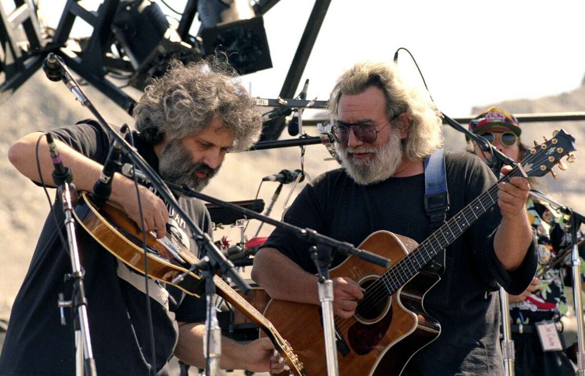 David Grisman, left, and Jerry Garcia perform at the music festival on Aug. 25, 1991.