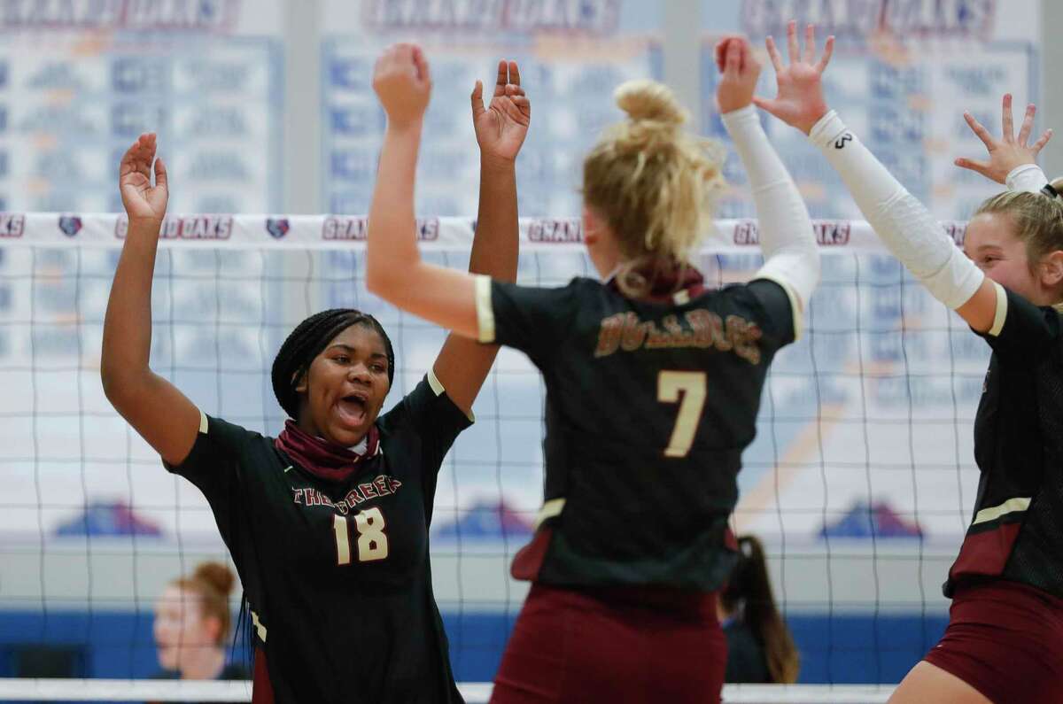 Summer Creek middle hitter Aspen Maxwell (18) reacts after scoring a point during a non-district high school volleyball match at Grand Oaks High School, Tuesday, Sept. 29, 2020, in Spring.