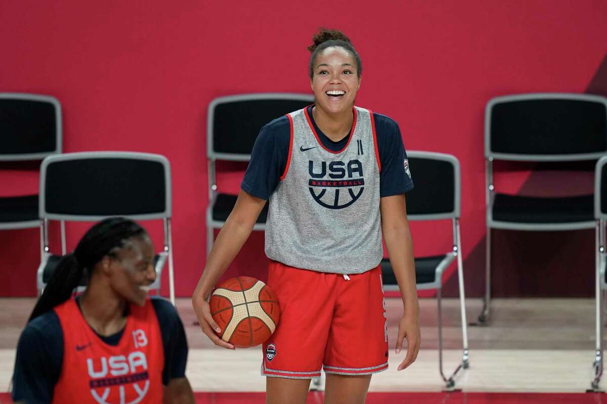 USA's Napheesa Collier (11) shares a laugh with teammates during a women's basketball practice at the 2020 Summer Olympics, Saturday, July 24, 2021, in Saitama, Japan.  (AP Photo/Eric Gay)