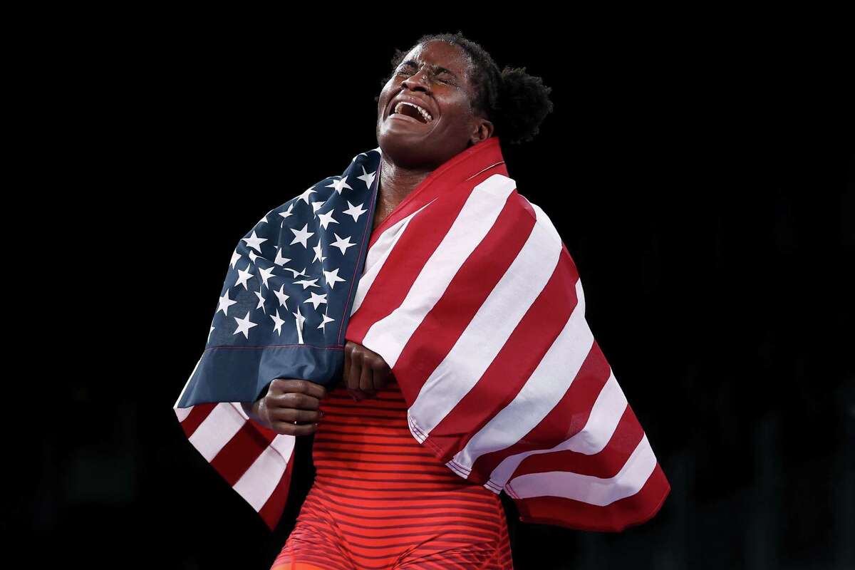 Tamyra Mariama Mensah-Stock of Team United States celebrates defeating Blessing Oborududu of Team Nigeria during the Women's Freestyle 68kg Gold Medal Match on day eleven of the Tokyo 2020 Olympic Games at Makuhari Messe Hall on Aug. 3, 2021, in Chiba, Japan.