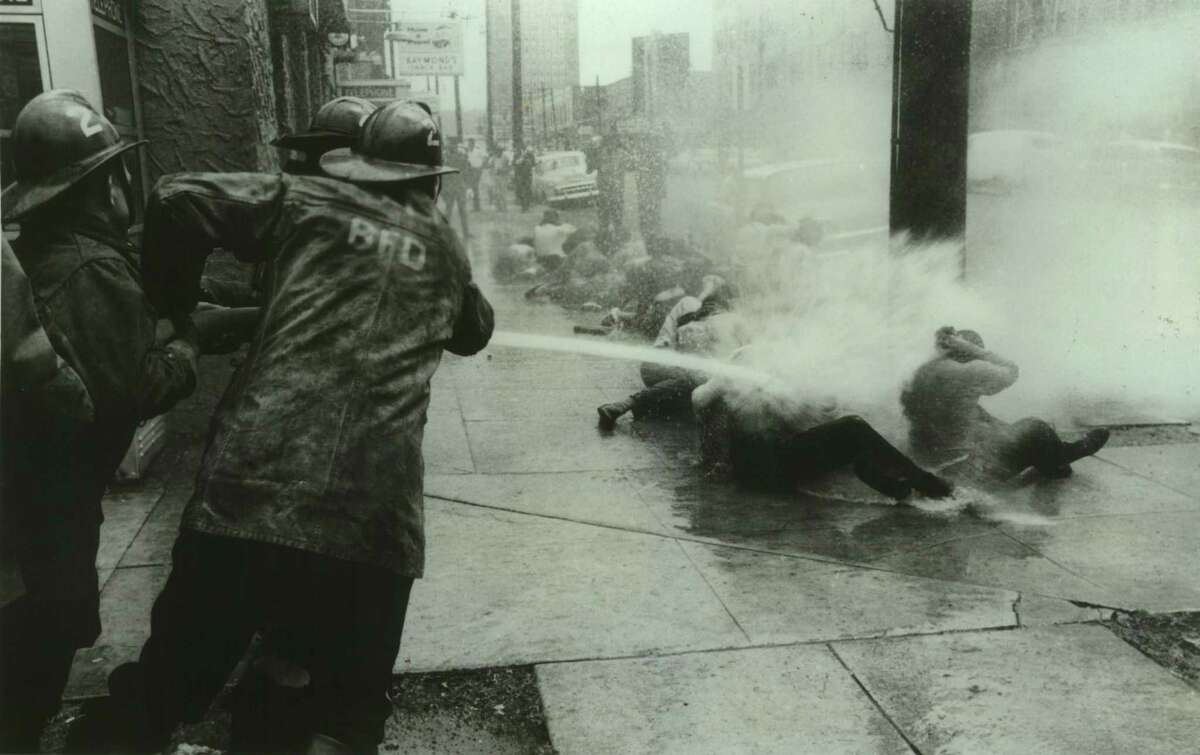 Angered by demonstrations in protest of segregation in Birmingham, Alabama, stores, the city's Commissioner of Public Safety, "Bull" Connor, ordered the fire department to turn its hoses on young demonstrators — which turned world attention on the civil rights struggle.