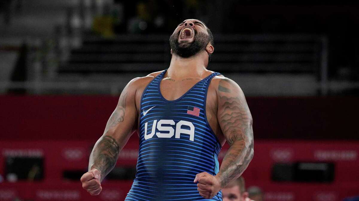 United States' Gable Dan Steveson celebrates after defeating Georgia's Gennadij Cudinovic during their men's freestyle 125kg wrestling final match at the 2020 Summer Olympics, Friday, Aug. 6, 2021, in Chiba, Japan. (AP Photo/Aaron Favila)