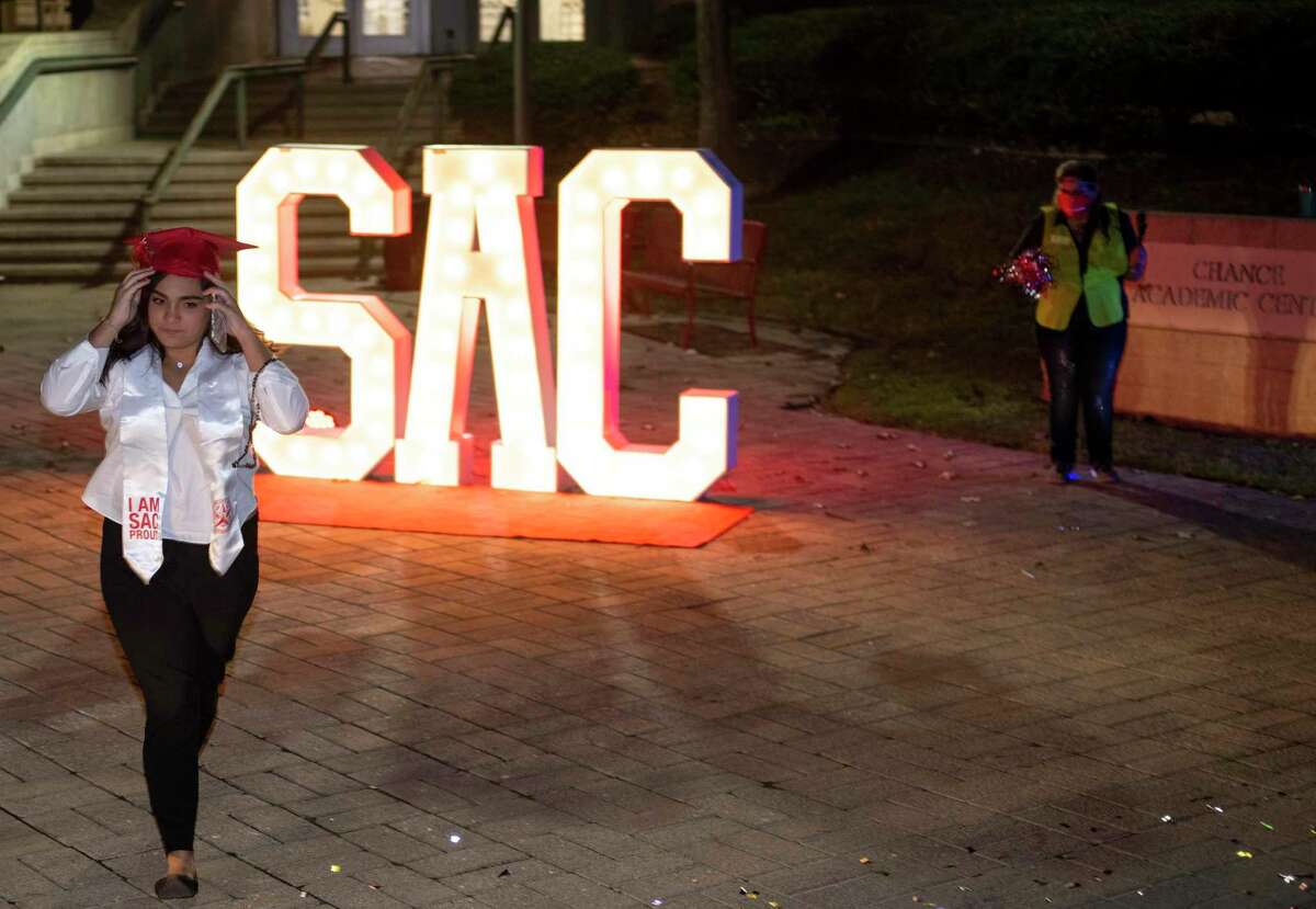 A student celebrates graduating from San Antonio College in 2020. Community colleges can now offer more four-year degrees, offering brighter futures and boosting the economy.