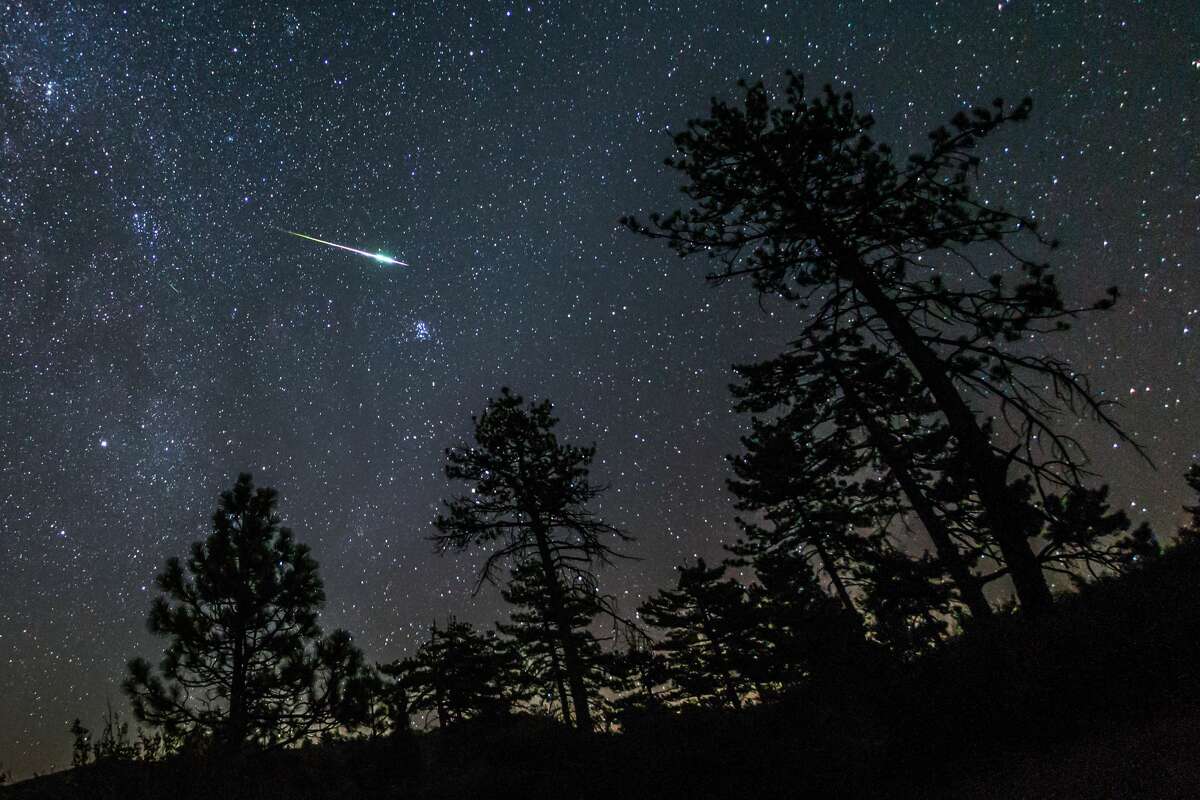 The Perseid meteor shower, which peaks this week, is expected to be the best meteor shower for years to come because there will be almost no moonlight, giving shooting stars a dark backdrop to enhance visibility. (Here, a meteor from the 2016 Perseid meteor shower streaks across the night sky in the Cleveland National Forest in California.)