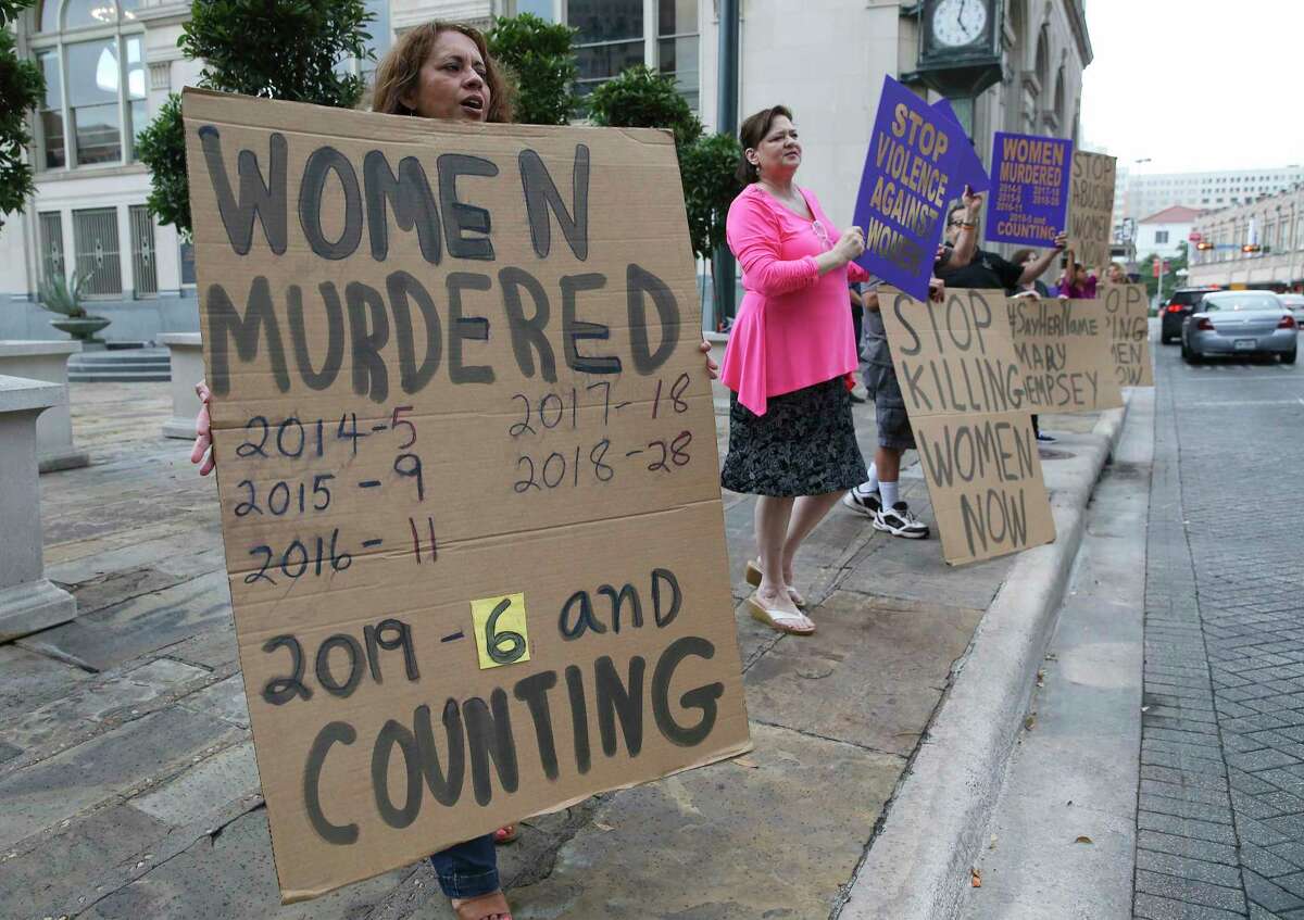 Men must lend their voices to the effort to end the plague of domestic violence in Bexar County. Here, people with the P.E.A.C.E. Initiative protest in 2019.