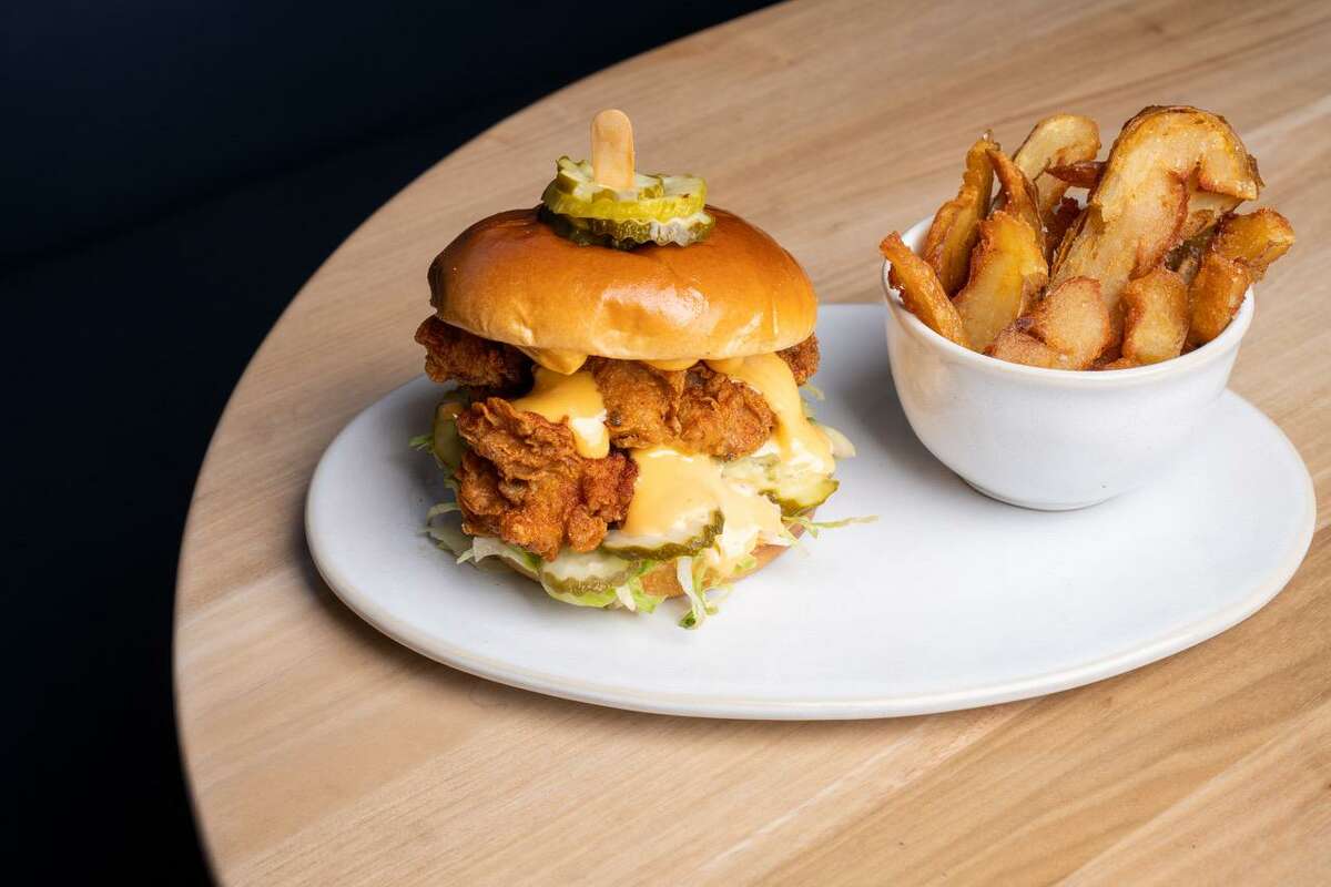 The fried chicken sandwich with aleppo mayo and salt-roasted fries at Roger Bar and Restaurant in Mountain View.