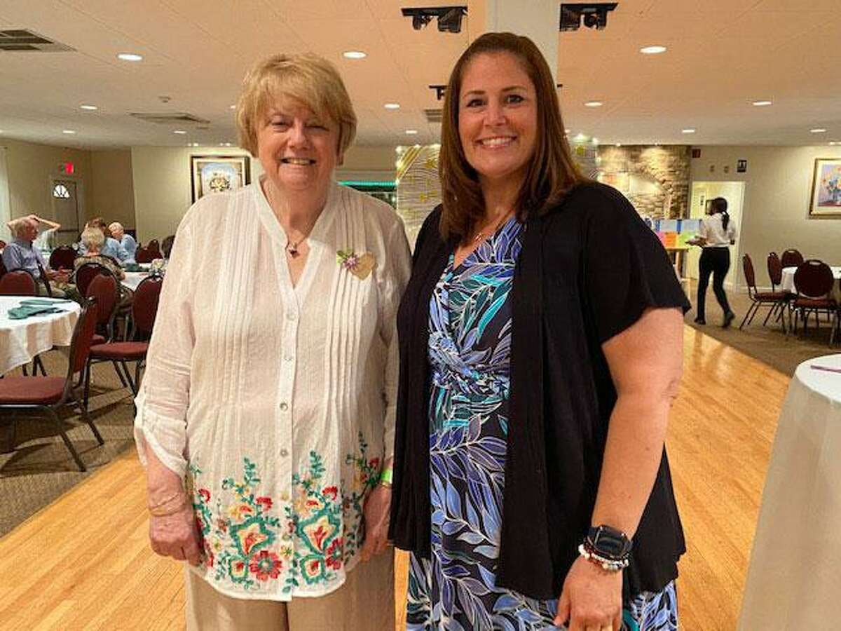 The Woman's Club of Danbury/New Fairfield recently raised $11,000 at a Silent Auction. Pictured are: Janet Jabieski, chair of the Woman’s Club’s Community Improvement Committee, and Kristy Zaleta, principal of Rogers Park Middle School in Danbury.