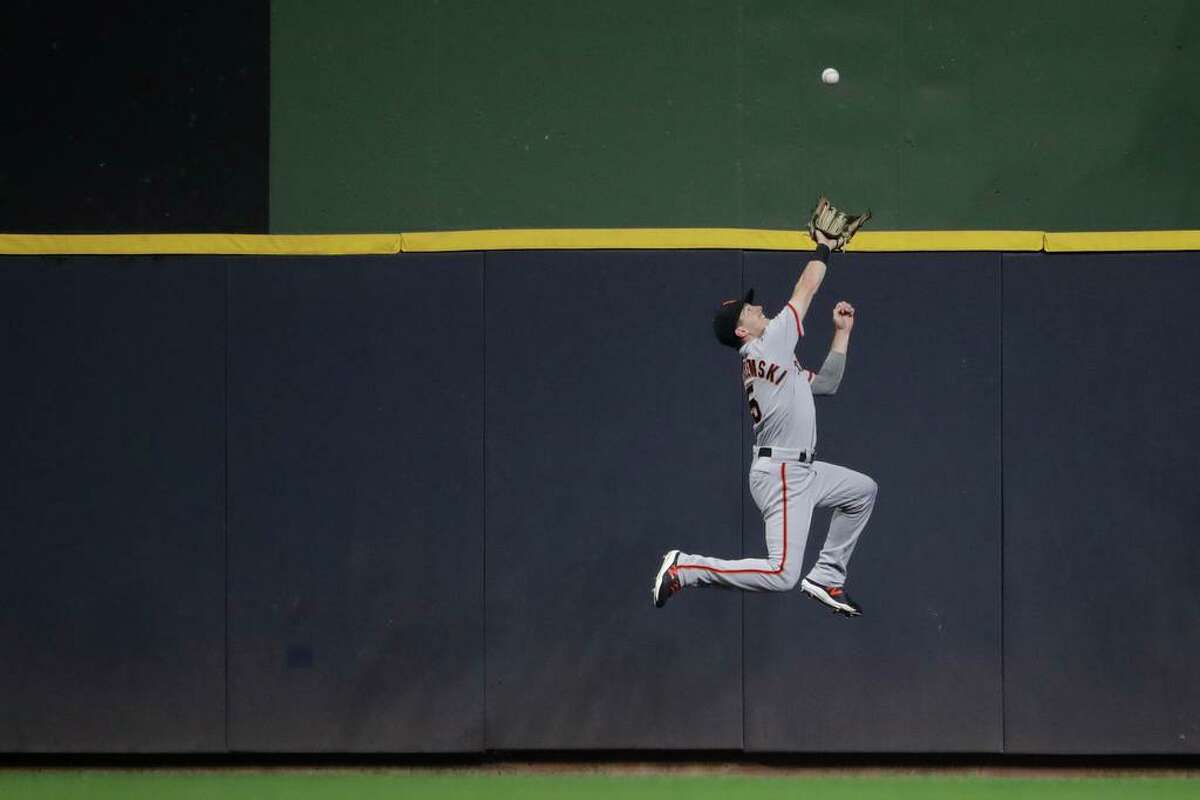 Giants fall in 10, wasting strong Webb start, spectacular Yastrzemski catch