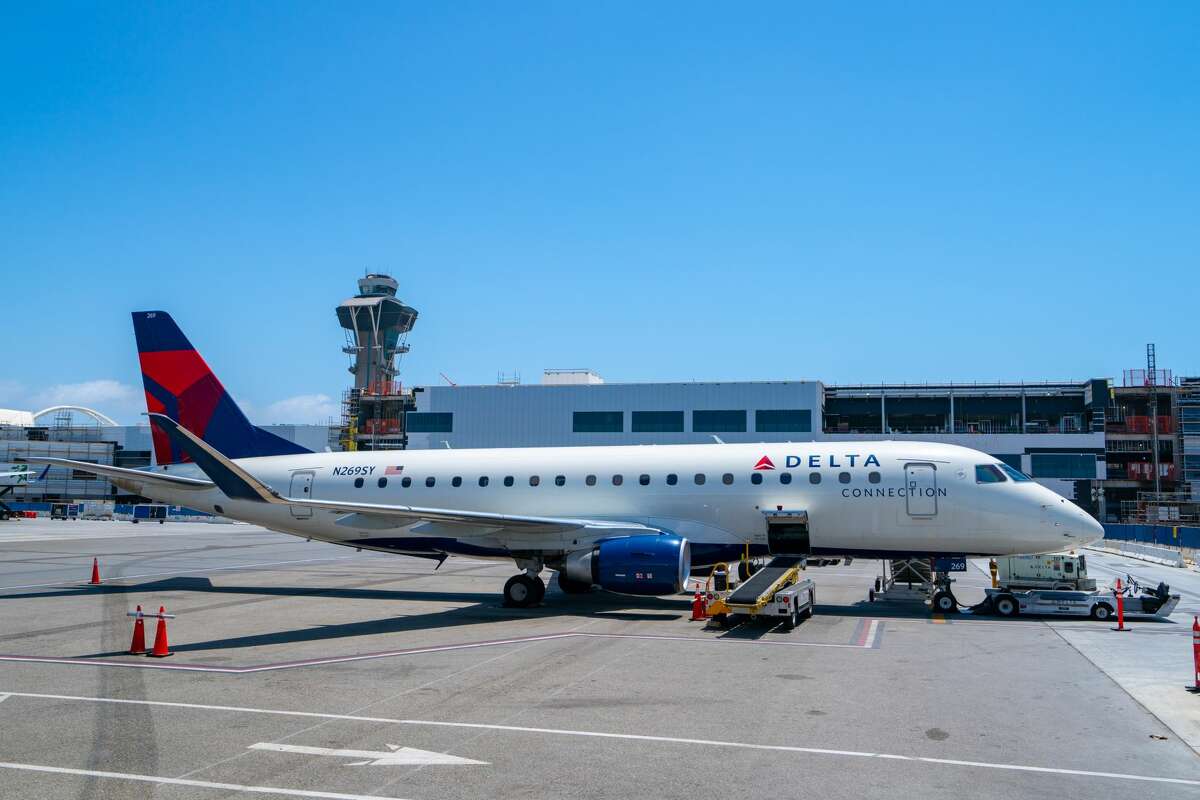 LOS ANGELES, CA - MAY 22: Delta Airlines Embraer ERJ-175 boards from public waiting area while Terminal 3 is under construction at Los Angeles International Airport on May 22, 2021 in Los Angeles, California. (Photo by AaronP/Bauer-Griffin/GC Images)