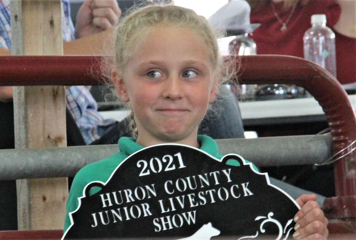 Around 250 animals went on the auction block Friday morning during the Junior Livestock Association sale at the 2021 Huron Community Fair on Friday morning. The sale took place at the Dennis M. Hagen Show and Sale Arena, with hog, feeders, fats and sheep all up for auction. The sale, as well as the fair, returned after a two-hiatus due to the COVID-19 pandemic.