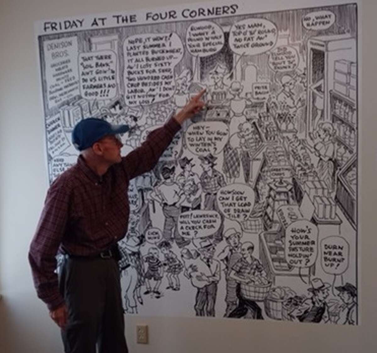 During a visit to the museum, Jim Denison, born in 1949, recognized his father, as well as a few other friends and family, in an enlarged cartoon entitled “Friday at the Four Corners” at a Brookside Museum exhibit.