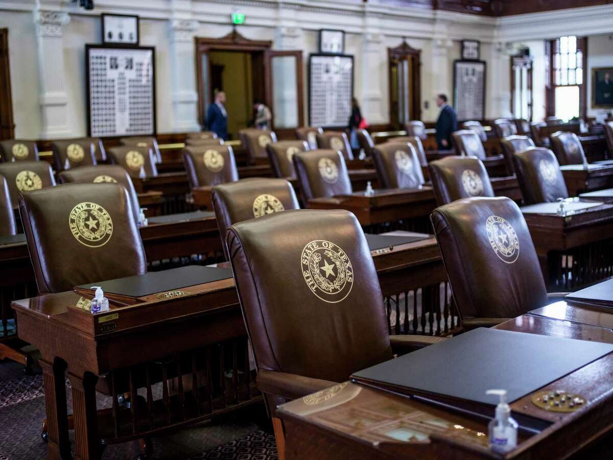 A number of seats sit empty as The Texas House of Representatives opens its second special session called by Governor Greg Abbott on Saturday, August 7, 2021 in Austin, Tx., U.S. The Texas House of Representatives did not have a quorum due to a number of Texas House Democrats being absent and adjourned quickly after opening the session on Saturday afternoon.