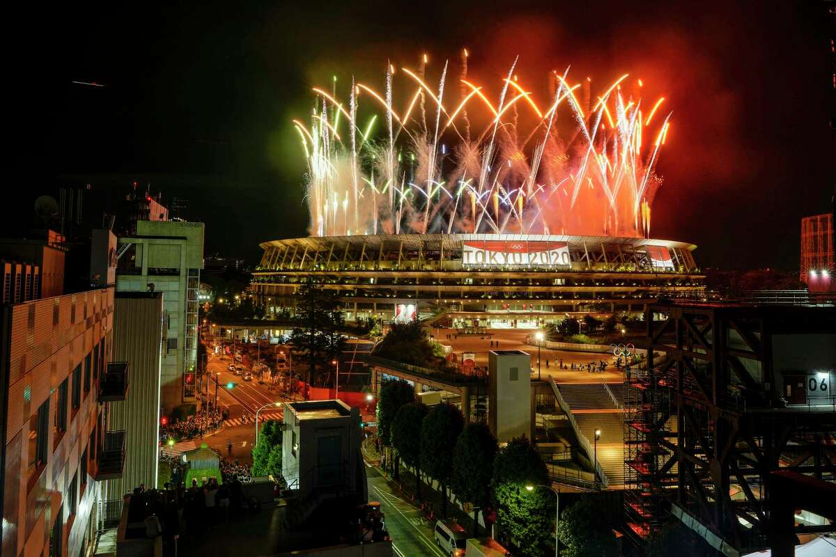 Fireworks illuminate over National Stadium during the closing ceremony of the 2020 Tokyo Olympics, Sunday, Aug. 8, 2021, in Tokyo.