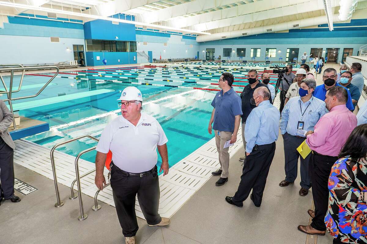 Aquatics Coordinator Louis Fruia gives a tour of the UISD Aquatic Center, Thursday, Aug. 5, 2021 during a preview of the new facility.
