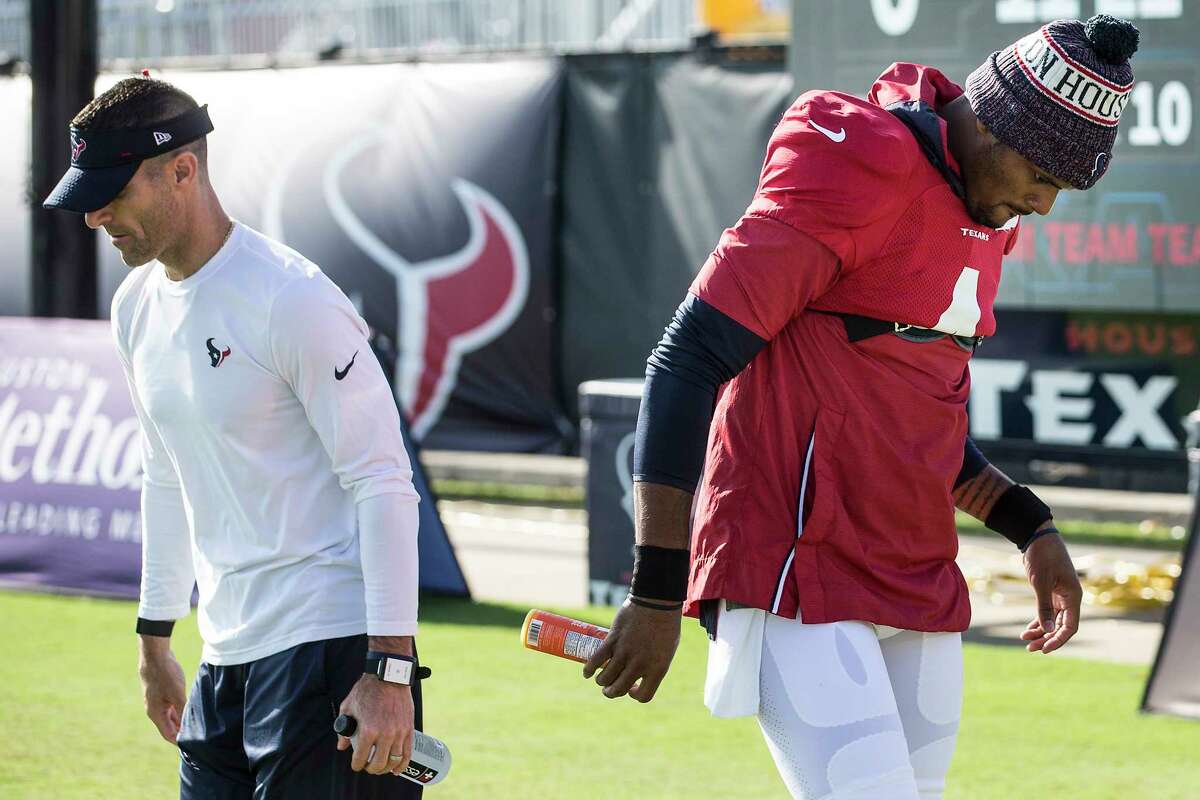 Houston Texans quarterback Deshaun Watson (4) walks to the practice bubble after talking to general manager Nick Caserio on the field during an NFL training camp football practice Monday, Aug. 9, 2021, in Houston.