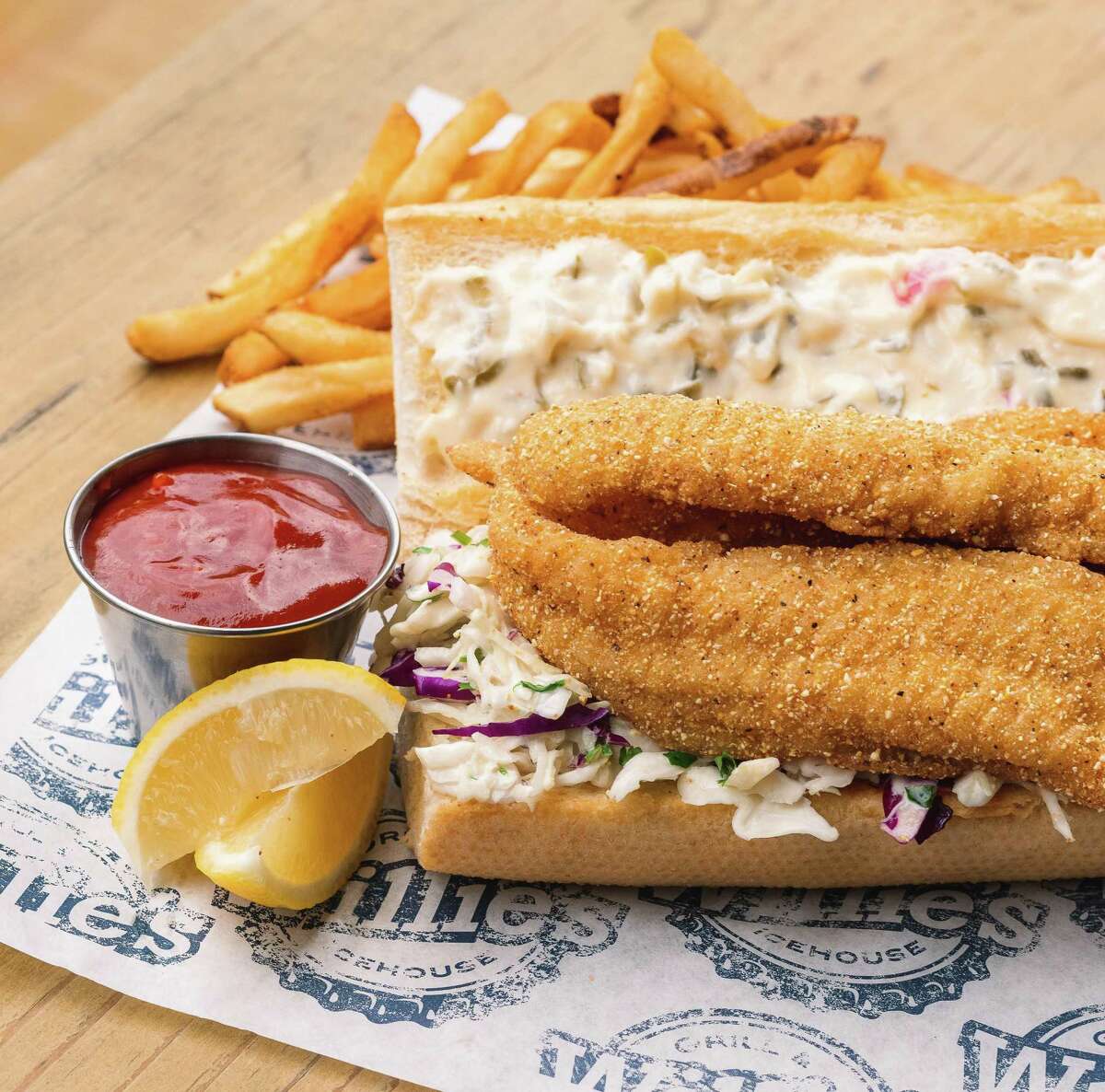 Catfish Po'boy (grilled, fried or blackened) served with fries, cole slaw and tartar sauce is a secret menu item at Willie's Grill & Icehouse.