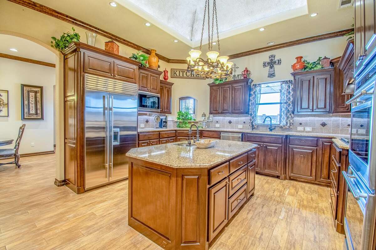 2.395 million Gardendale home features Texasshaped pool